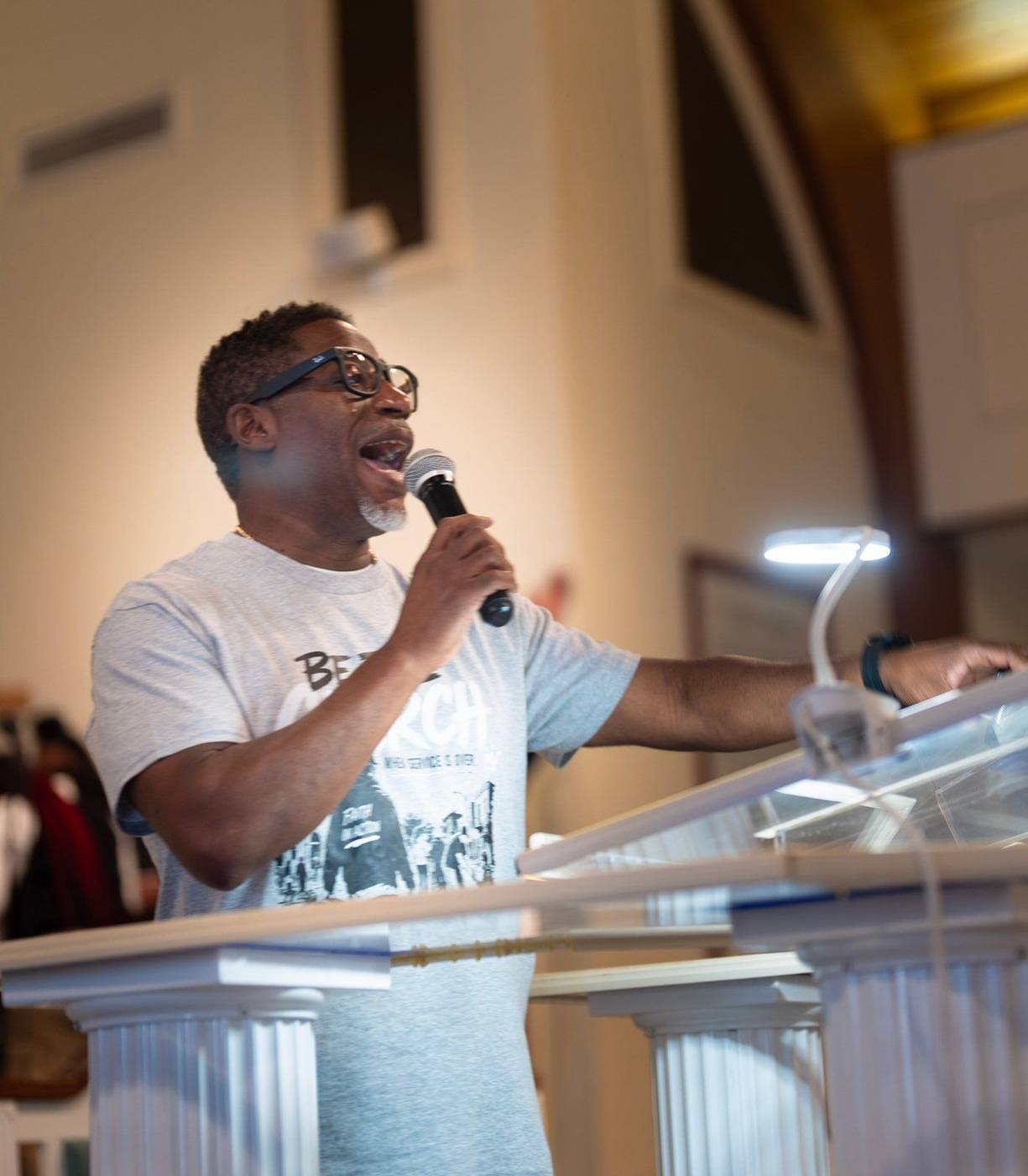 Pastor Ty Harris preaching at the Shiloh pulpit